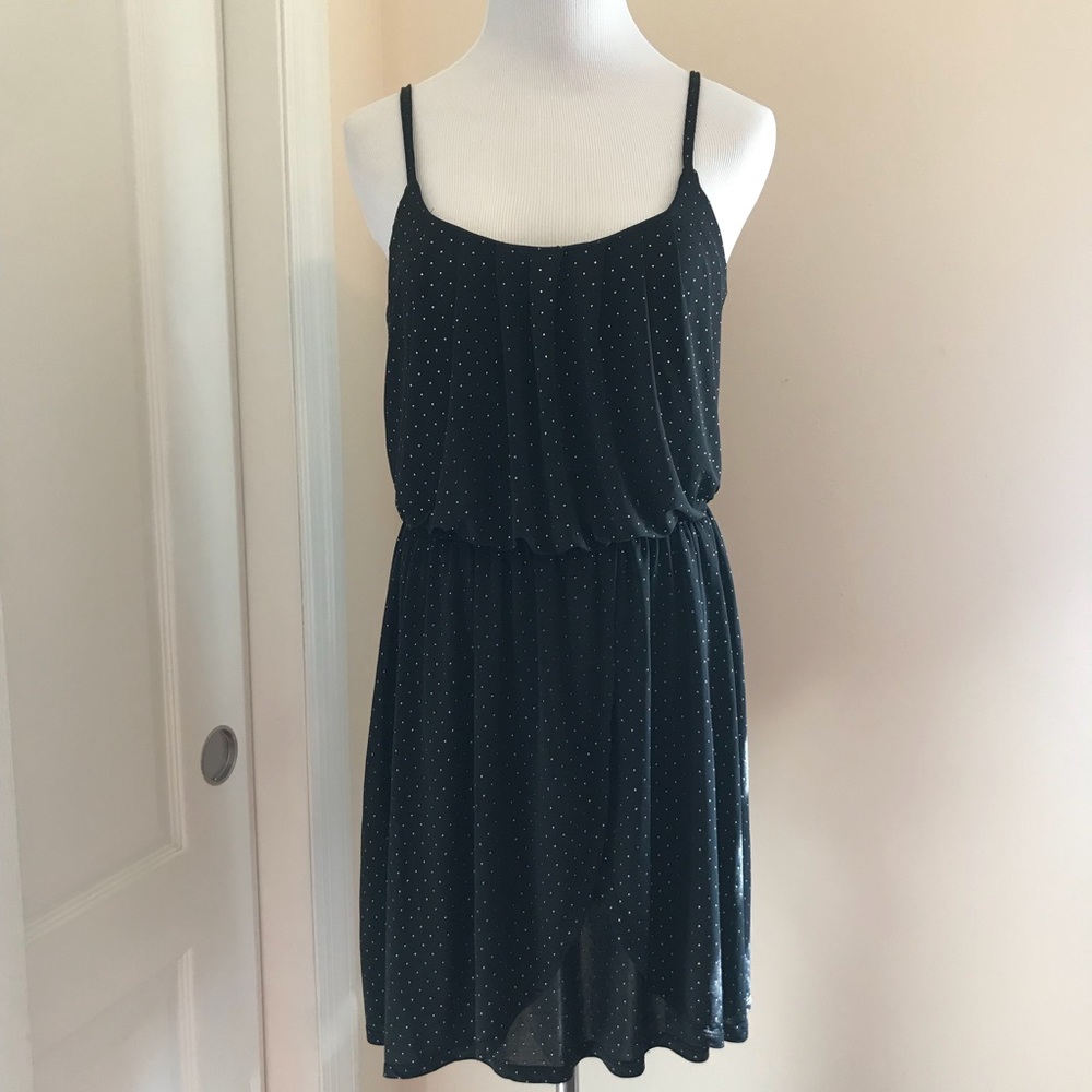 Black knit dress with gold dots